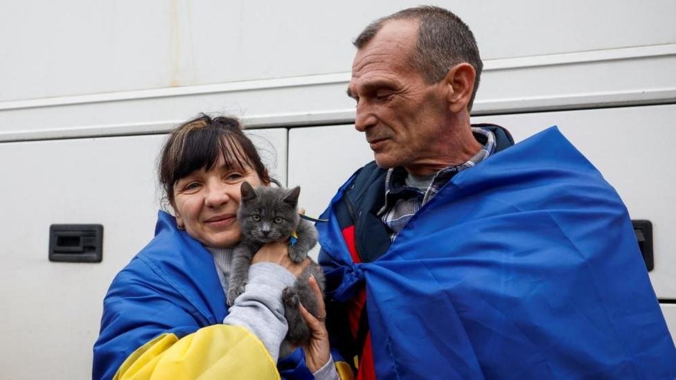 Ukrainian Evacuees Reunite With Family After Ceasefire Exit